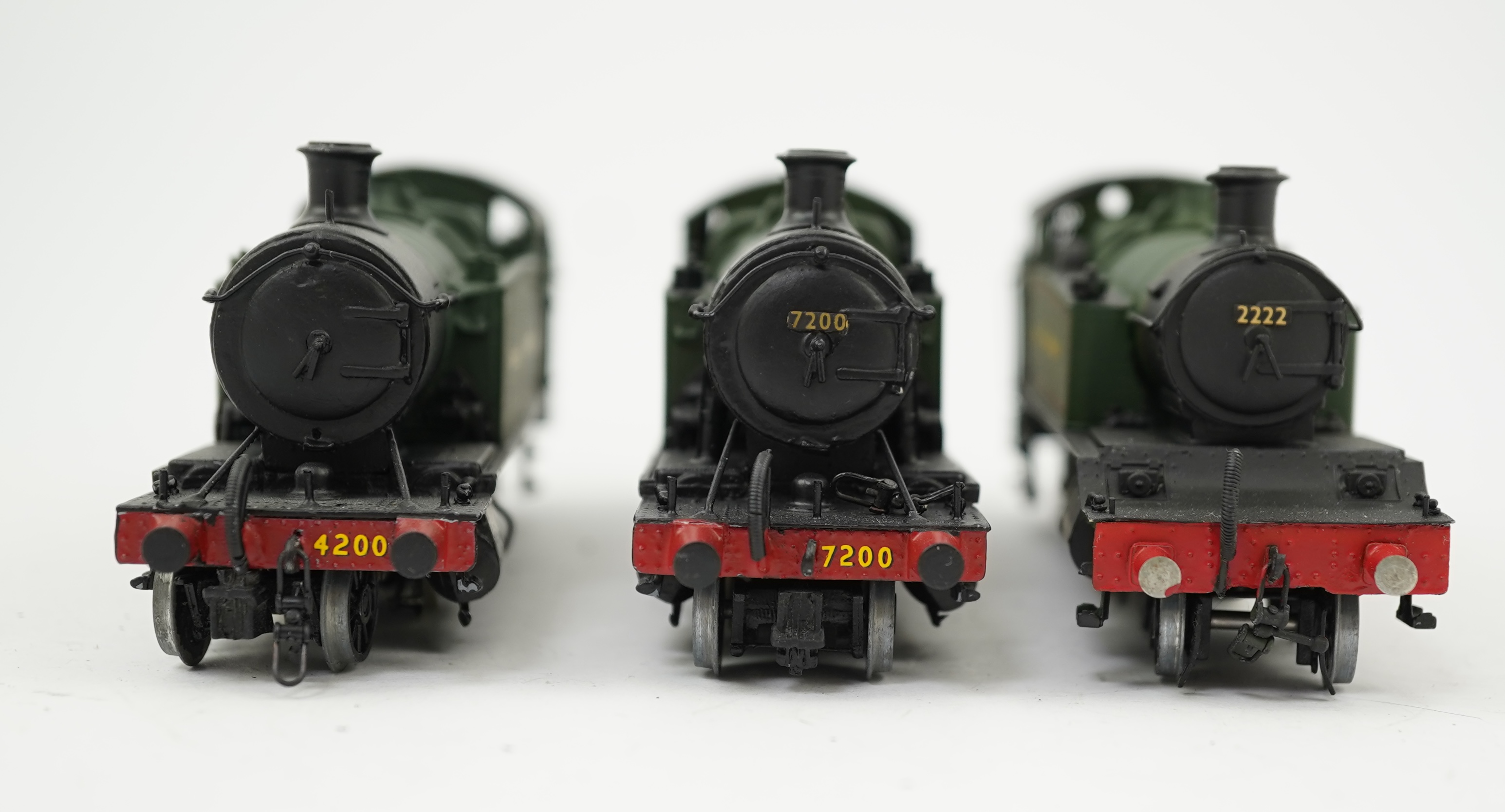 Three 00 gauge kit built GWR tank locomotives, two brass and white metal; a 42xx class 2-8-0T, 4200, together with an 72xx class 2-8-2T, 7200, plus a plastic/resin and metal 22xx class 4-4-2T, 2222, all constructed, pain